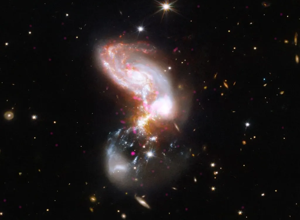 NASA钱德拉望远镜捕捉到星系碰撞的壮观景象 图片